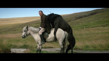 Movie still for Of Horses and Men.